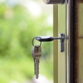 house keys in the front door staged