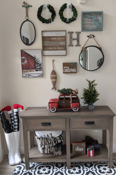 wall and table tastefully decorated for Christmas